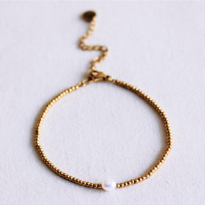 Beaded bracelet with a pearl
