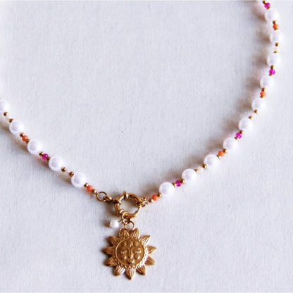 Facetparelcollier met zonnebedel - roze/oranje